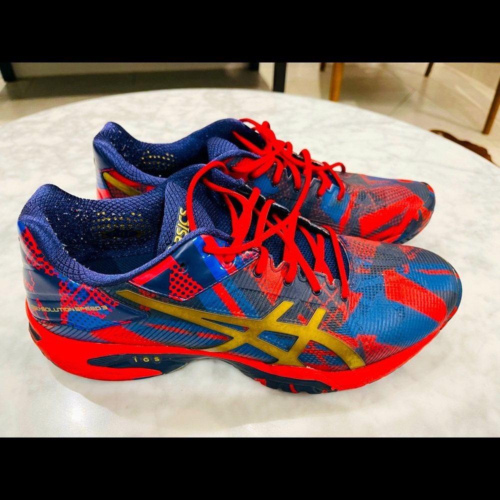 Asics sneakers. Beautiful and Vibrant colors. Worn a few times